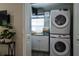 Laundry room with stackable washer and dryer at 801 E 8Th Ave, New Smyrna Beach, FL 32169