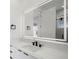 Modern bathroom with a floating vanity, quartz countertop, and sleek fixtures at 8010 Firenze Blvd, Orlando, FL 32836