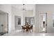 Breakfast nook with round table and chairs, marble floors and large windows at 8010 Firenze Blvd, Orlando, FL 32836