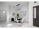 Formal dining room features an elegant chandelier and seating for six at 8010 Firenze Blvd, Orlando, FL 32836