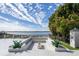 Modern fire pit area with lake view at 8010 Firenze Blvd, Orlando, FL 32836