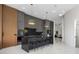 Contemporary kitchen with sleek dark cabinetry and marble island at 8010 Firenze Blvd, Orlando, FL 32836