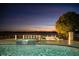 Relaxing pool and spa at sunset, lake view at 8010 Firenze Blvd, Orlando, FL 32836