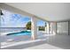 Inviting pool and spa with waterfront views at 8010 Firenze Blvd, Orlando, FL 32836