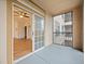 Private balcony with sliding glass doors and view at 8010 Tuscany Way # 5302, Davenport, FL 33896