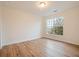 Spacious bedroom with hardwood floors and large window at 8010 Tuscany Way # 5302, Davenport, FL 33896