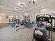 Well-equipped gym with various exercise machines at 8010 Tuscany Way # 5302, Davenport, FL 33896