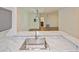 Kitchen features marble countertops and stainless steel sink at 8010 Tuscany Way # 5302, Davenport, FL 33896