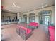 Covered patio with seating near the pool at 8010 Tuscany Way # 5302, Davenport, FL 33896