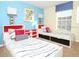 Twin bedroom with built in shelving and blue walls at 8938 Majesty Palm Rd, Kissimmee, FL 34747