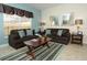 Comfortable living room with two sofas and a coffee table at 8938 Majesty Palm Rd, Kissimmee, FL 34747