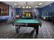 Game room with billiard table, ping pong, and arcade games at 8938 Majesty Palm Rd, Kissimmee, FL 34747