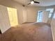 Spacious Primary bedroom with ample closet space and access to balcony at 911 N Orange Ave # 532, Orlando, FL 32801