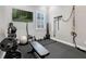 In-home gym with weight bench, TRX straps and TV at 13230 Fossick Rd, Windermere, FL 34786