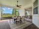 Covered patio with seating area, ceiling fan, and view of backyard at 13230 Fossick Rd, Windermere, FL 34786