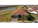 Luxury home with tile roof, located on a golf course community at 13370 Alderley Dr, Orlando, FL 32832