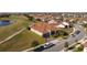 Luxury home with tile roof, located on a golf course community at 13370 Alderley Dr, Orlando, FL 32832