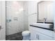Modern bathroom with marble shower and floating vanity at 13370 Alderley Dr, Orlando, FL 32832