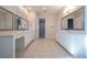 Double vanity bathroom with quartz countertops and ample storage at 13370 Alderley Dr, Orlando, FL 32832