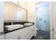 Modern bathroom with dual sinks and marble shower at 13370 Alderley Dr, Orlando, FL 32832