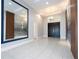 Entryway with tiled floor, large mirror, and chandelier at 13370 Alderley Dr, Orlando, FL 32832