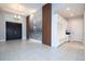 Open entryway with tiled floors and built-in storage at 13370 Alderley Dr, Orlando, FL 32832