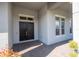 Front entrance with double doors and a brick walkway at 13370 Alderley Dr, Orlando, FL 32832