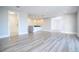 Spacious game room with wet bar and access to other rooms at 13370 Alderley Dr, Orlando, FL 32832