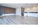 Open game room with wet bar and media wall at 13370 Alderley Dr, Orlando, FL 32832