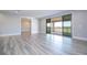 Game room with sliding doors leading to a balcony at 13370 Alderley Dr, Orlando, FL 32832