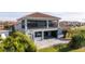 House back view with large patio and screened balcony at 13370 Alderley Dr, Orlando, FL 32832