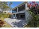 Home exterior showcasing a large patio and covered lanai at 13370 Alderley Dr, Orlando, FL 32832