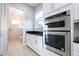 Kitchen with built-in double oven and microwave at 13370 Alderley Dr, Orlando, FL 32832