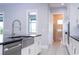 Kitchen features a farmhouse sink and stainless steel appliances at 13370 Alderley Dr, Orlando, FL 32832