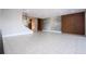 Open living space with tile flooring and modern wall accents at 13370 Alderley Dr, Orlando, FL 32832