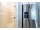 Walk-in pantry with ample shelving for storage at 13370 Alderley Dr, Orlando, FL 32832