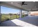 Large covered patio offering stunning golf course views at 13370 Alderley Dr, Orlando, FL 32832