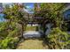 Pergola covered in blooming bougainvillea at 13370 Alderley Dr, Orlando, FL 32832