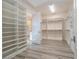 Spacious walk-in closet with ample shelving and hanging space at 13370 Alderley Dr, Orlando, FL 32832