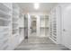 Luxurious walk-in closet offering extensive storage options at 13370 Alderley Dr, Orlando, FL 32832