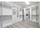 Large walk-in closet featuring shelves, rods, and drawers at 13370 Alderley Dr, Orlando, FL 32832