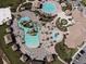 Community pool and recreation area with multiple pools and water features at 1555 Palmero Way, Davenport, FL 33896
