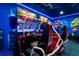 Exciting game room with racing game and superhero decor at 1555 Palmero Way, Davenport, FL 33896