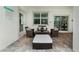 Cozy patio seating area with wicker furniture at 1555 Palmero Way, Davenport, FL 33896