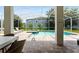 View of the pool and spa from the patio at 1555 Palmero Way, Davenport, FL 33896