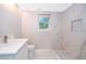 Clean bathroom with a walk-in shower and white vanity at 159 Flomich St, Daytona Beach, FL 32117