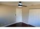 Spacious bedroom with dark hardwood floors and large closet at 17211 Se 160Th Avenue Rd, Weirsdale, FL 32195