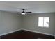 Bright bedroom with hardwood floors and ceiling fan at 17211 Se 160Th Avenue Rd, Weirsdale, FL 32195
