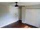 Spacious bedroom with dark hardwood floors and large closet at 17211 Se 160Th Avenue Rd, Weirsdale, FL 32195