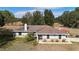 Ranch style home with stone accents and large backyard at 17211 Se 160Th Avenue Rd, Weirsdale, FL 32195